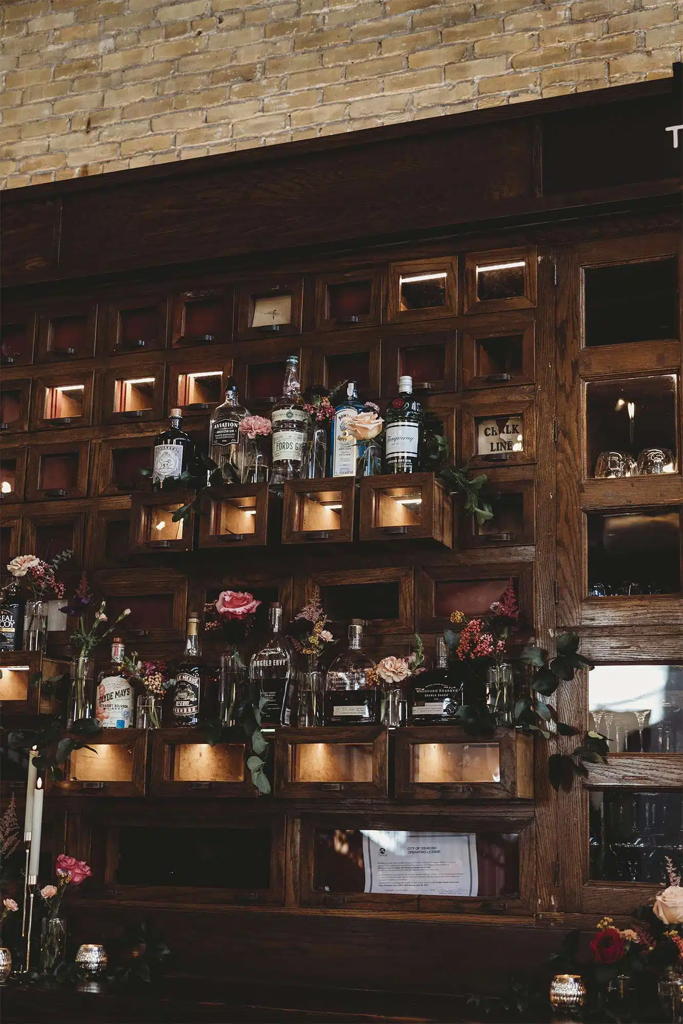 The main bar at the Gibson Social Club decked out in flowers from 88 Events.