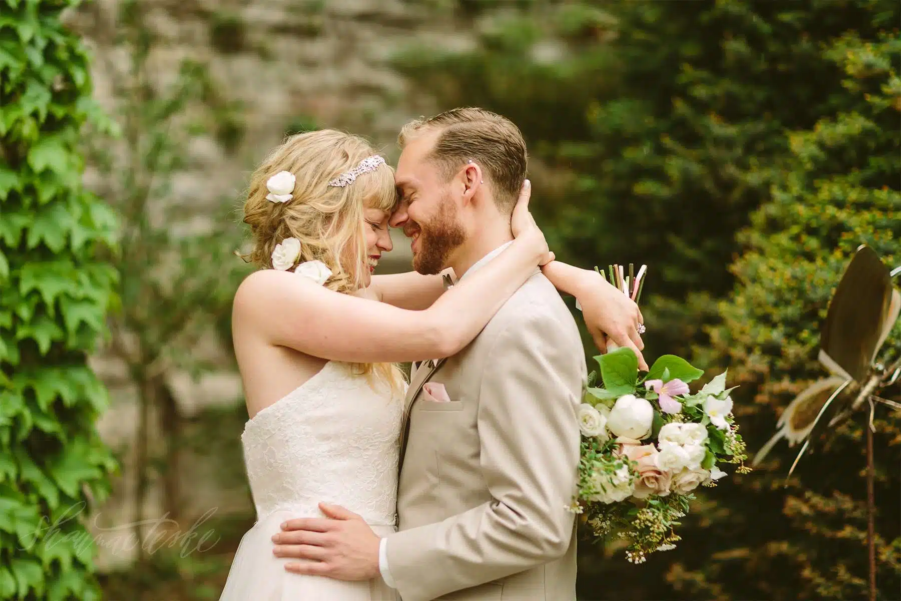 Bride and groom embrace