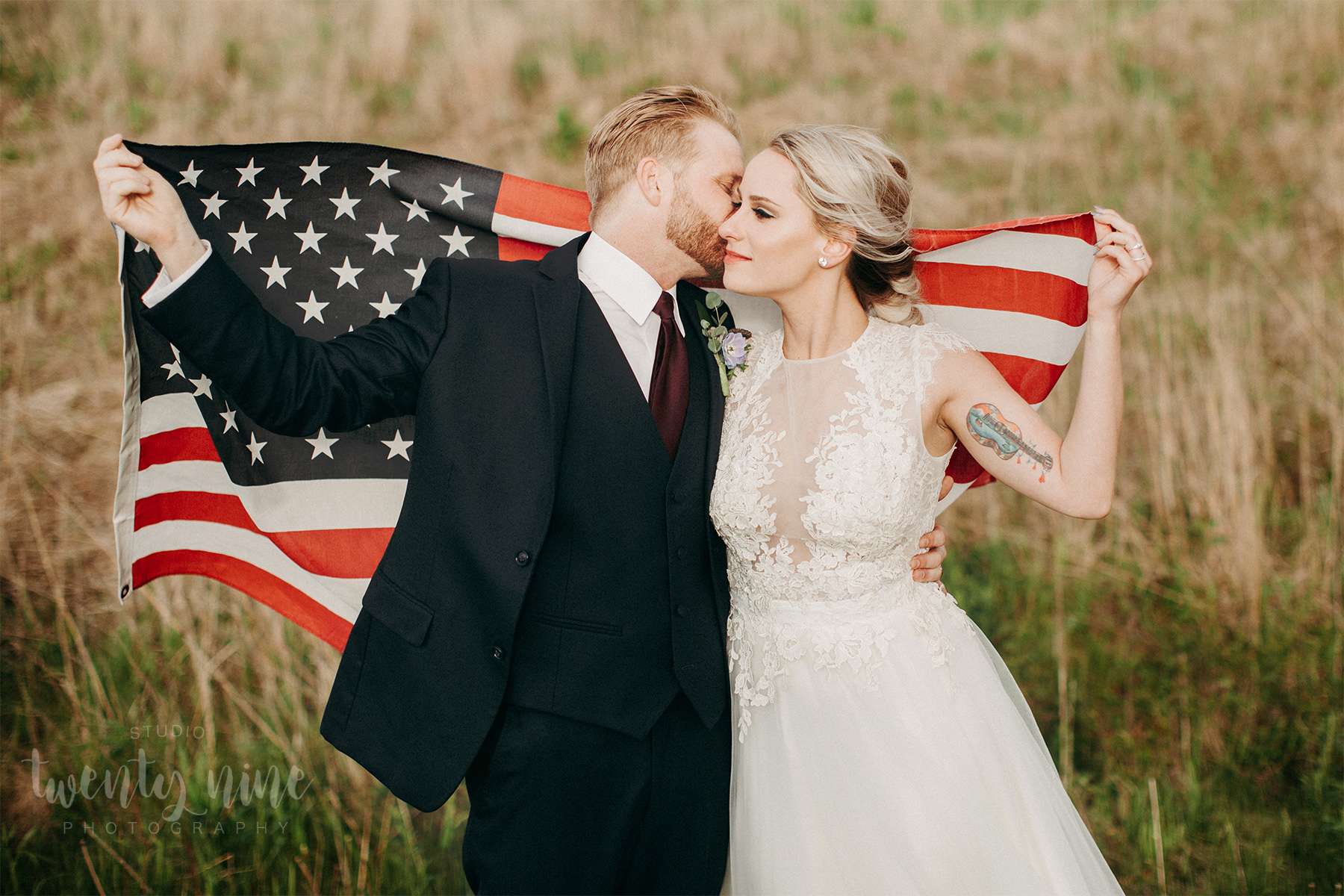 Bride and groom with flag