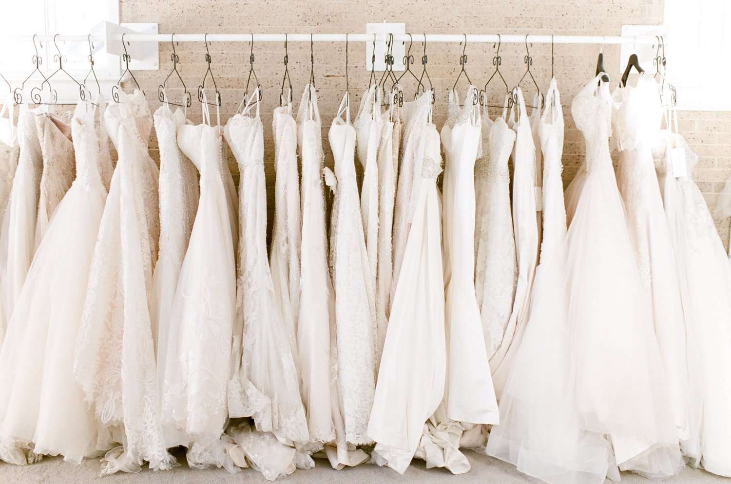 Wedding gowns on rack- Bridal Elegance in Kaukauna, WI