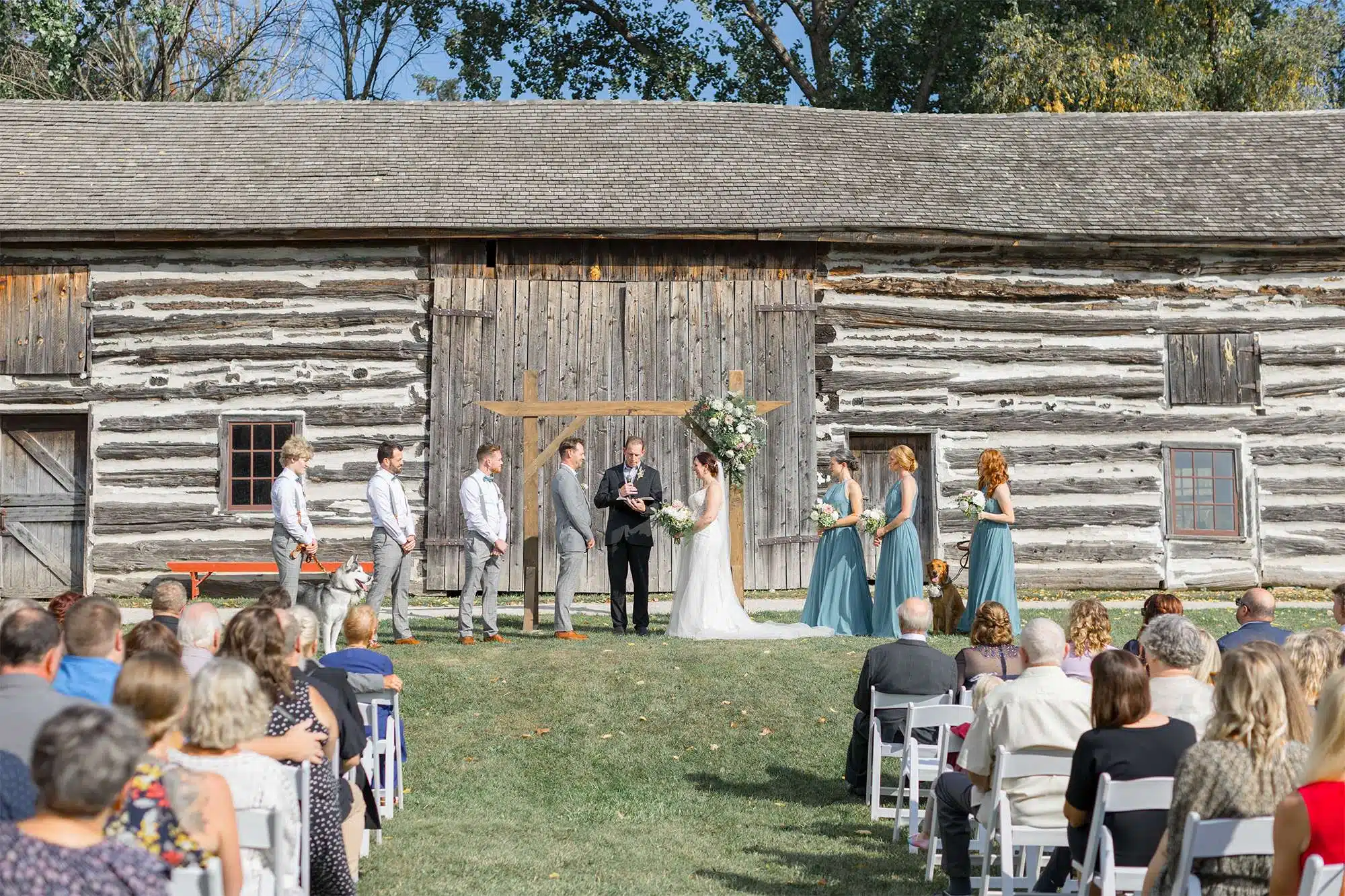 Wedding ceremony outside the Belgium Farm at Heritage Hill State Historical Park.