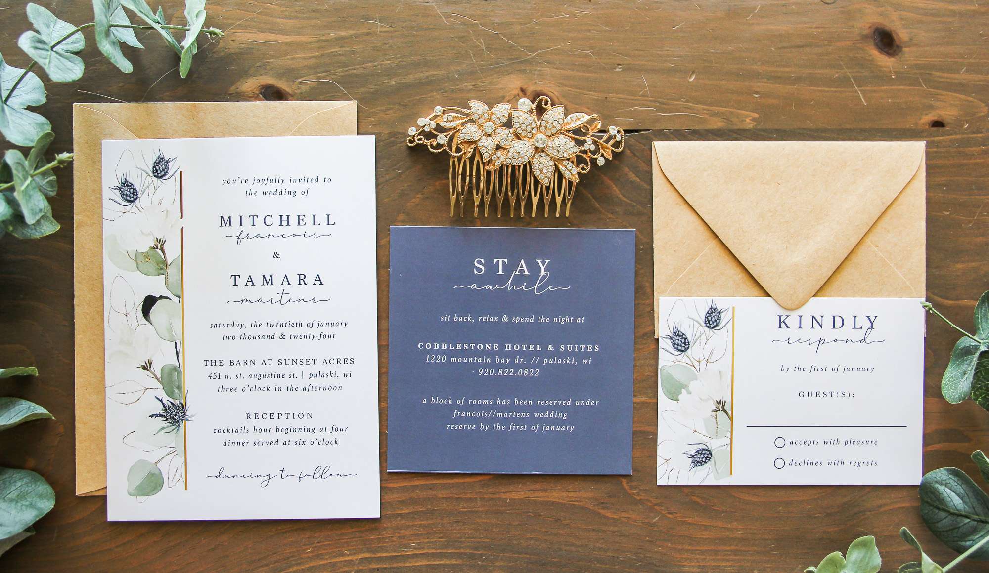 A wedding invitation suite with floral embellishments by L.designs.