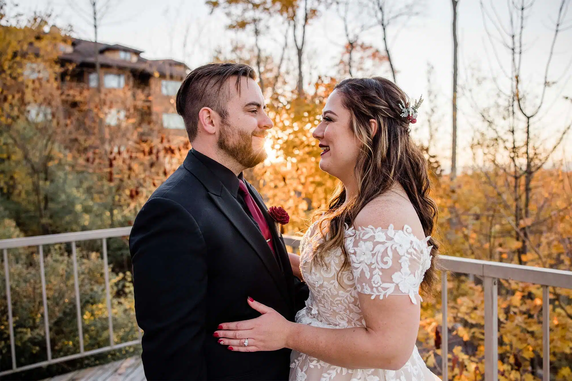 Bride and groom pose for portraits at the Landmark Resort at sunset.