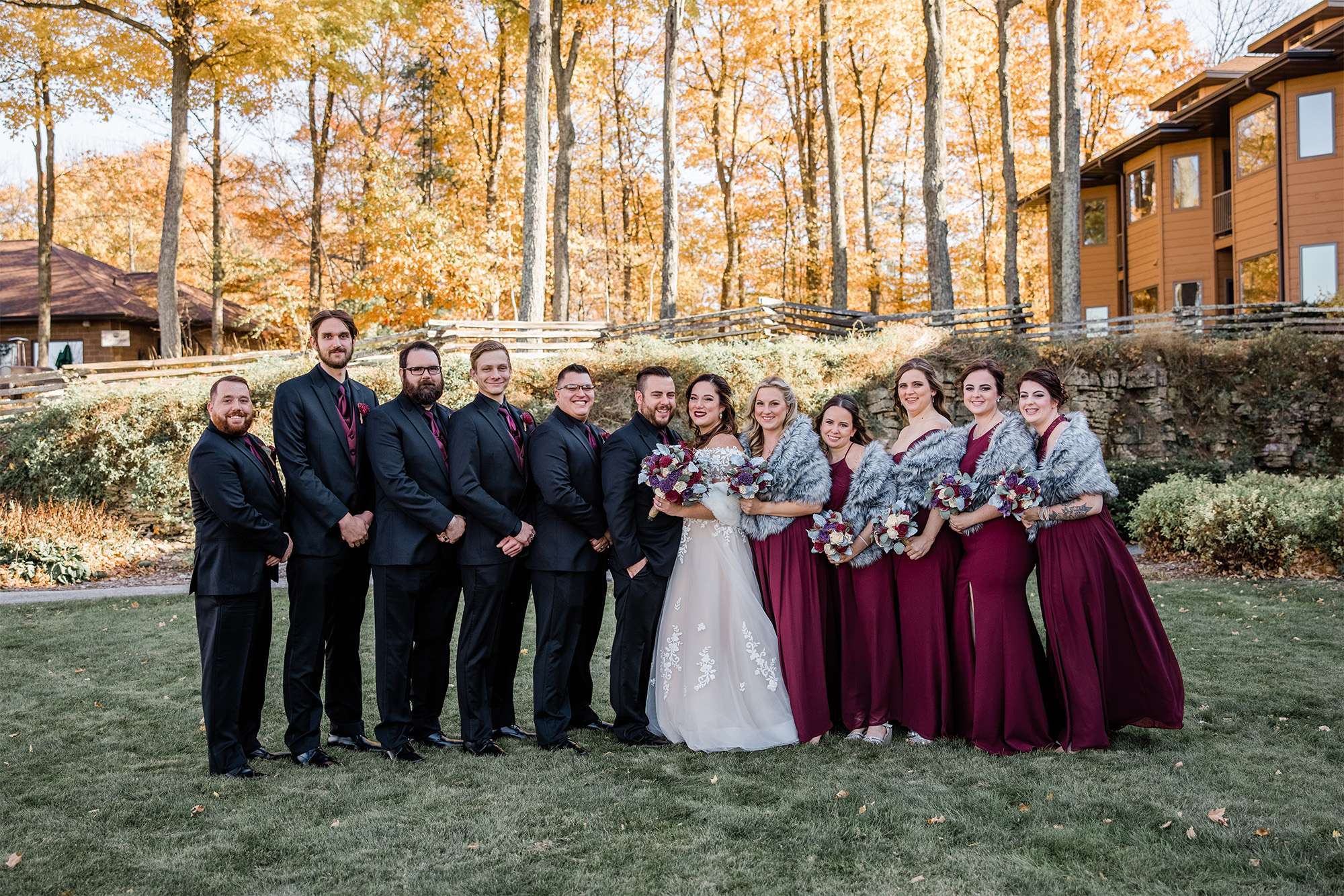 Wedding party poses outside the Landmark Resort in Door County.