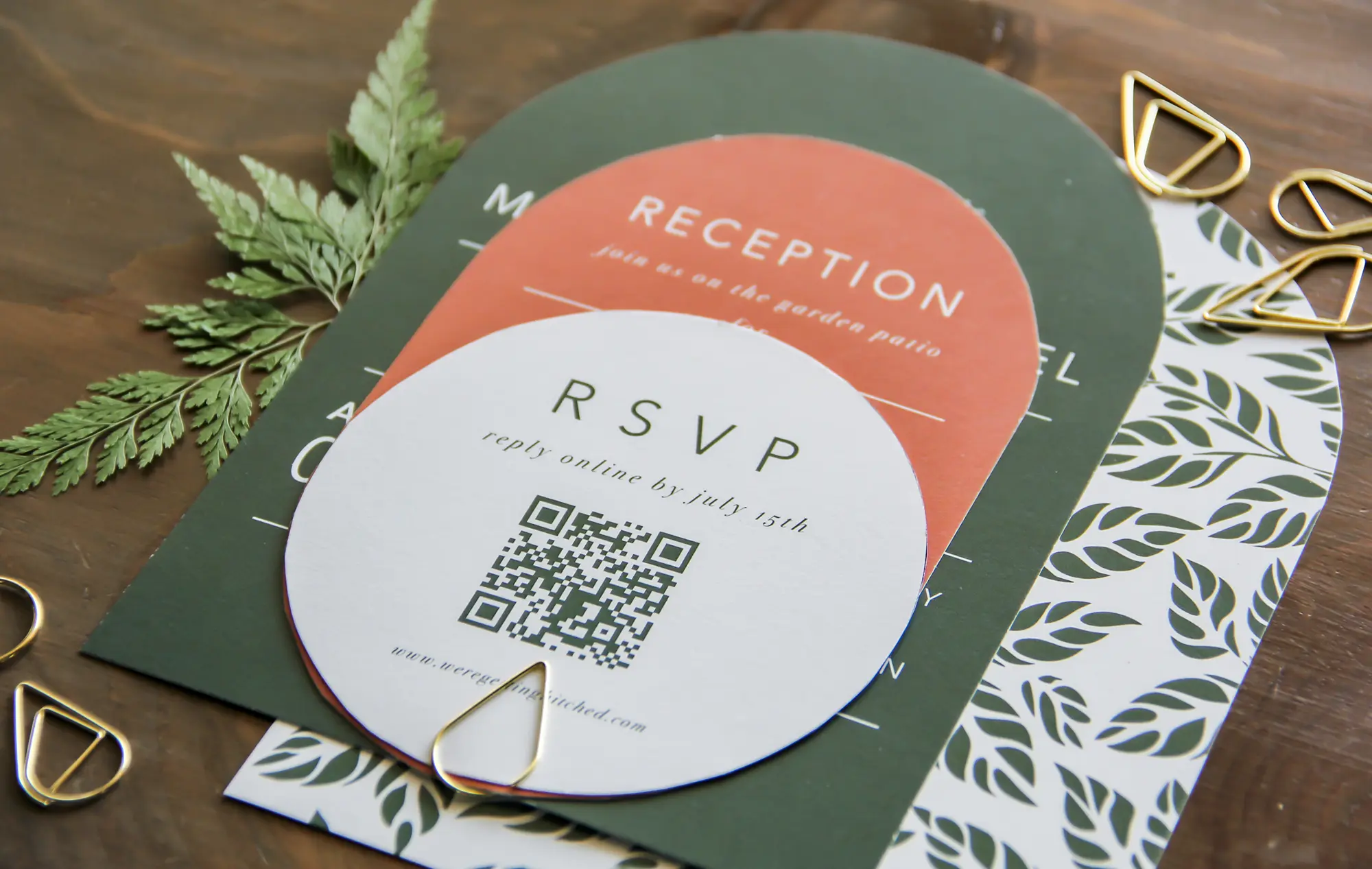 Die cut invitations in green, orange and white by L. Designs
