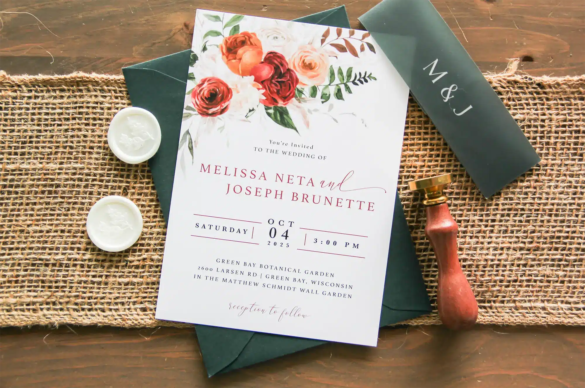 Boho wedding invite in forest green and fall color florals and wax seals