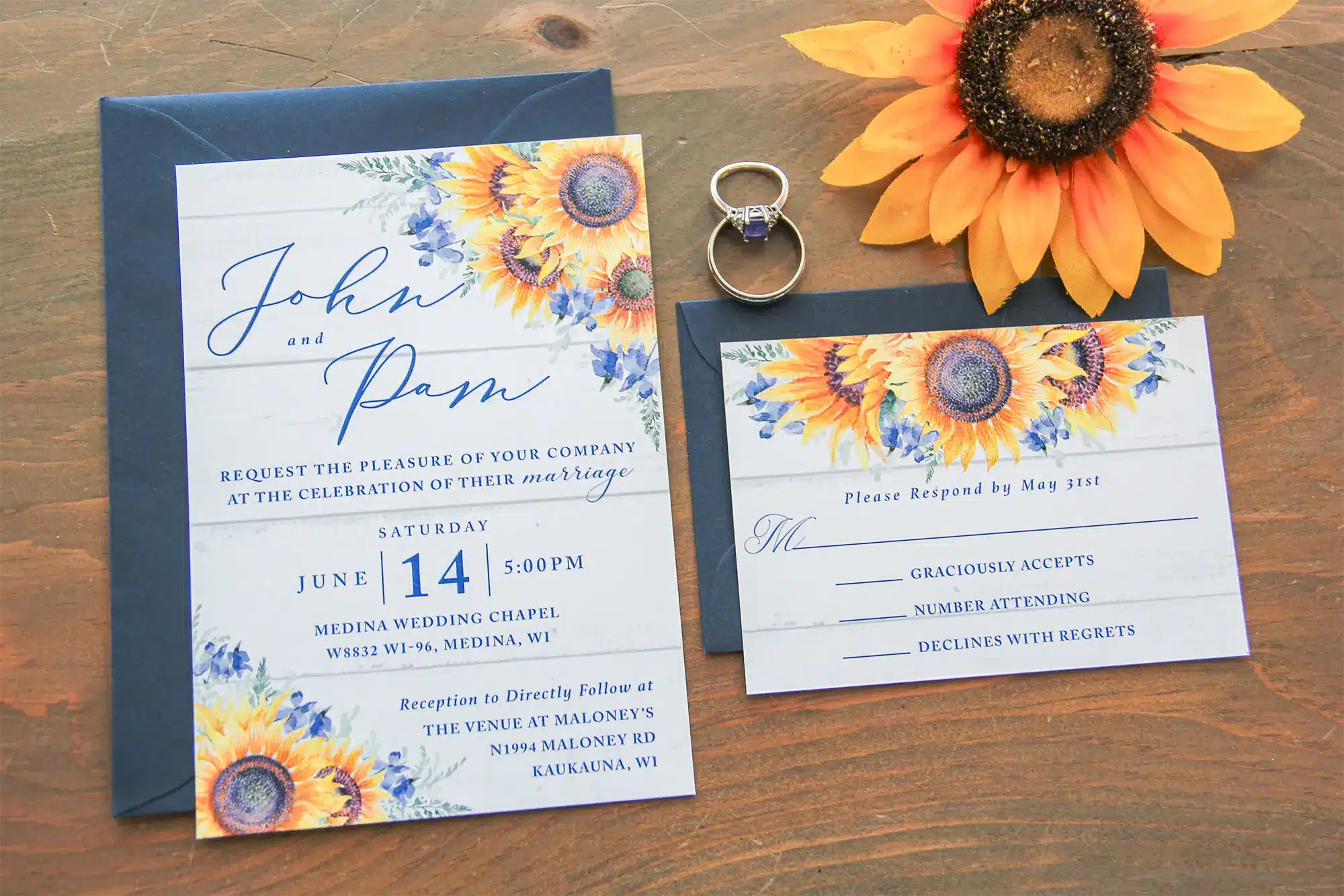 Bright sunflower themed invites with blue accents