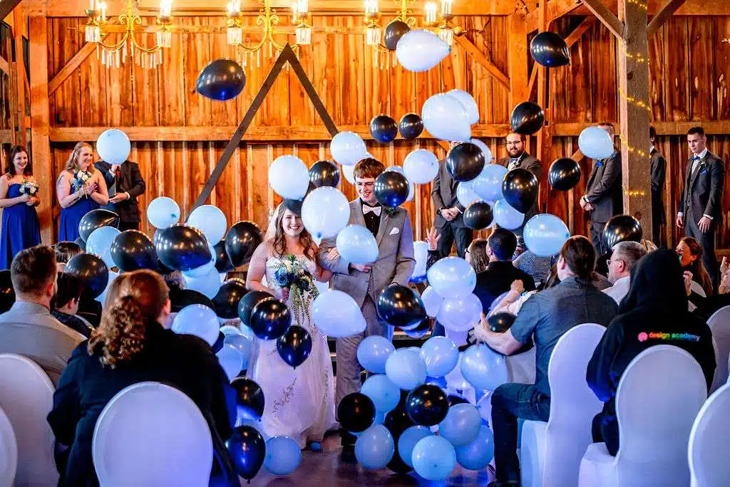 Balloon Drop at conclusion of barn wedding ceremony.