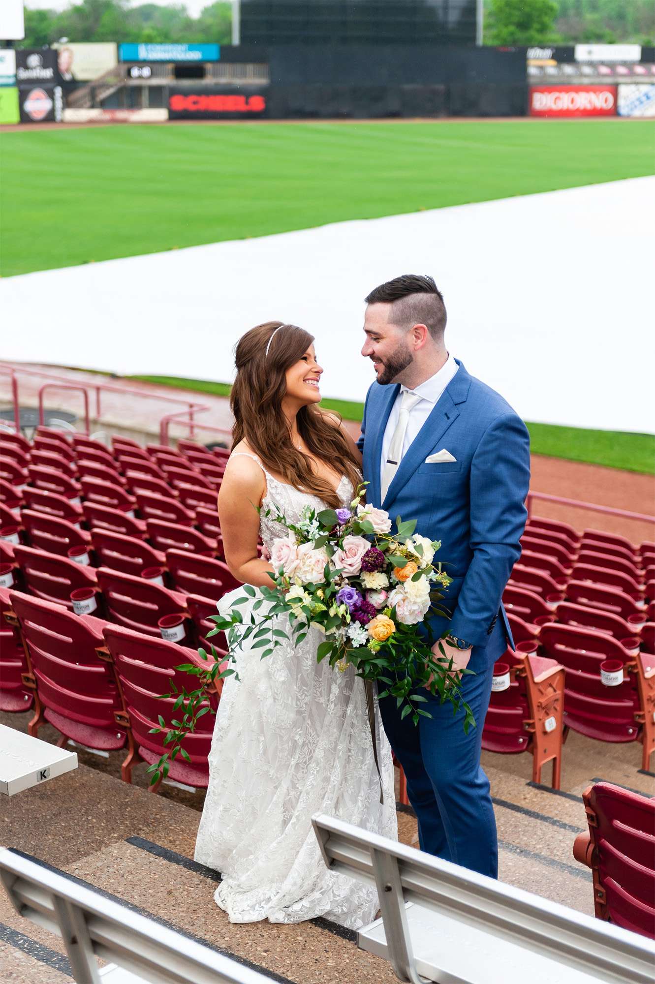 Bride and groom outside of the Fox Cities Stadium in Appleton, WI.