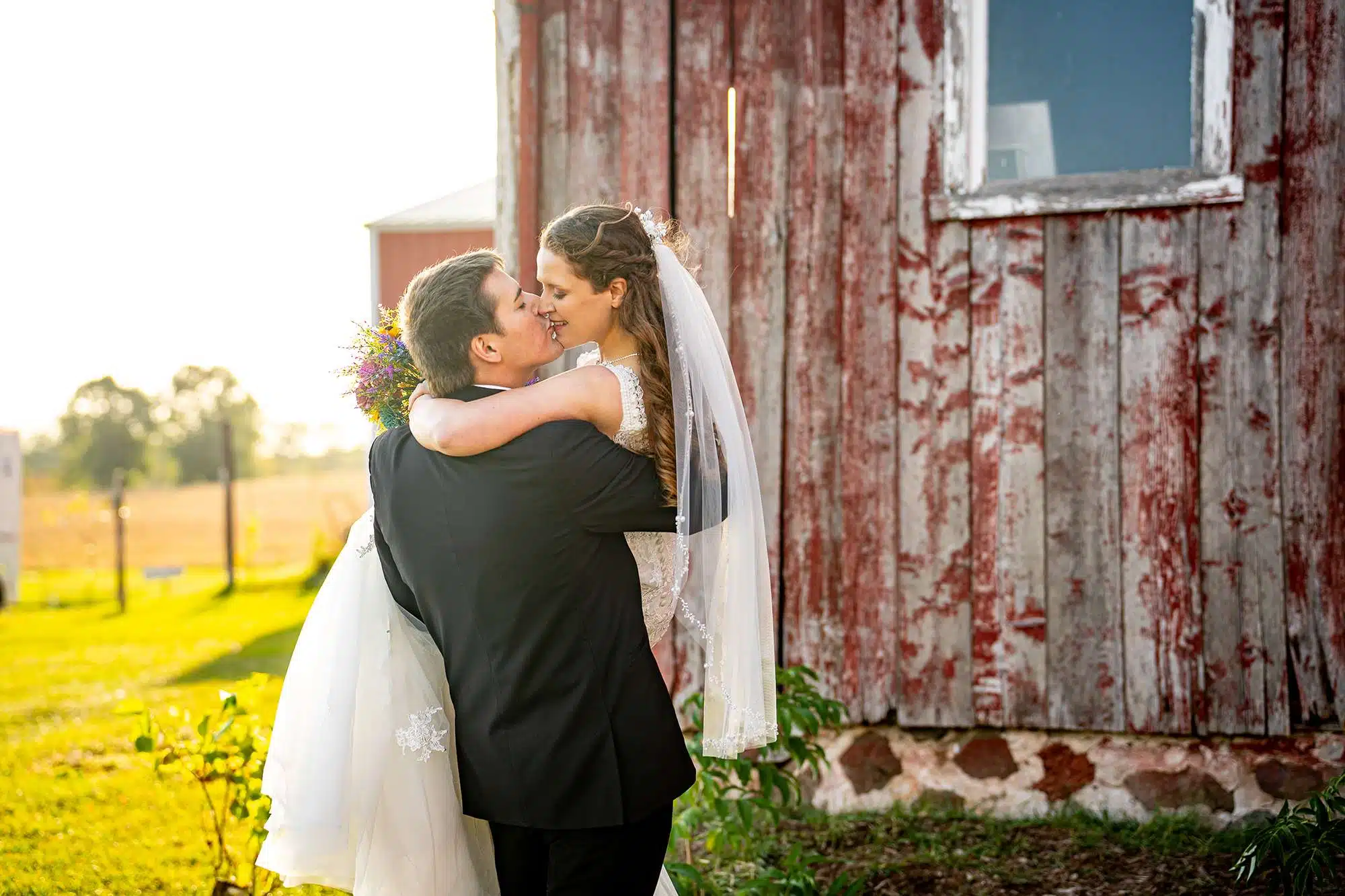 Bride and Groom outside Woelfel Homestead Farm
