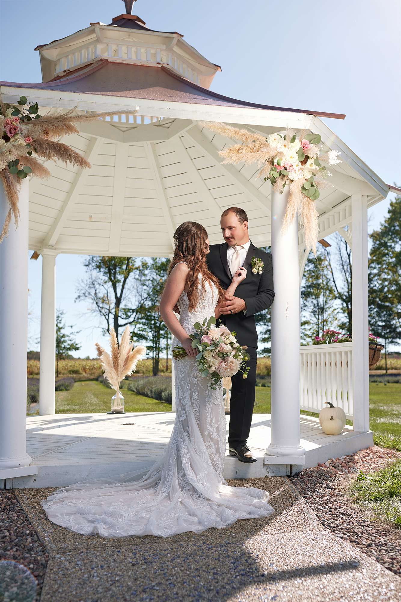 Bride and Groom in front of gazebo at Butterfly Creek Lavender Farm