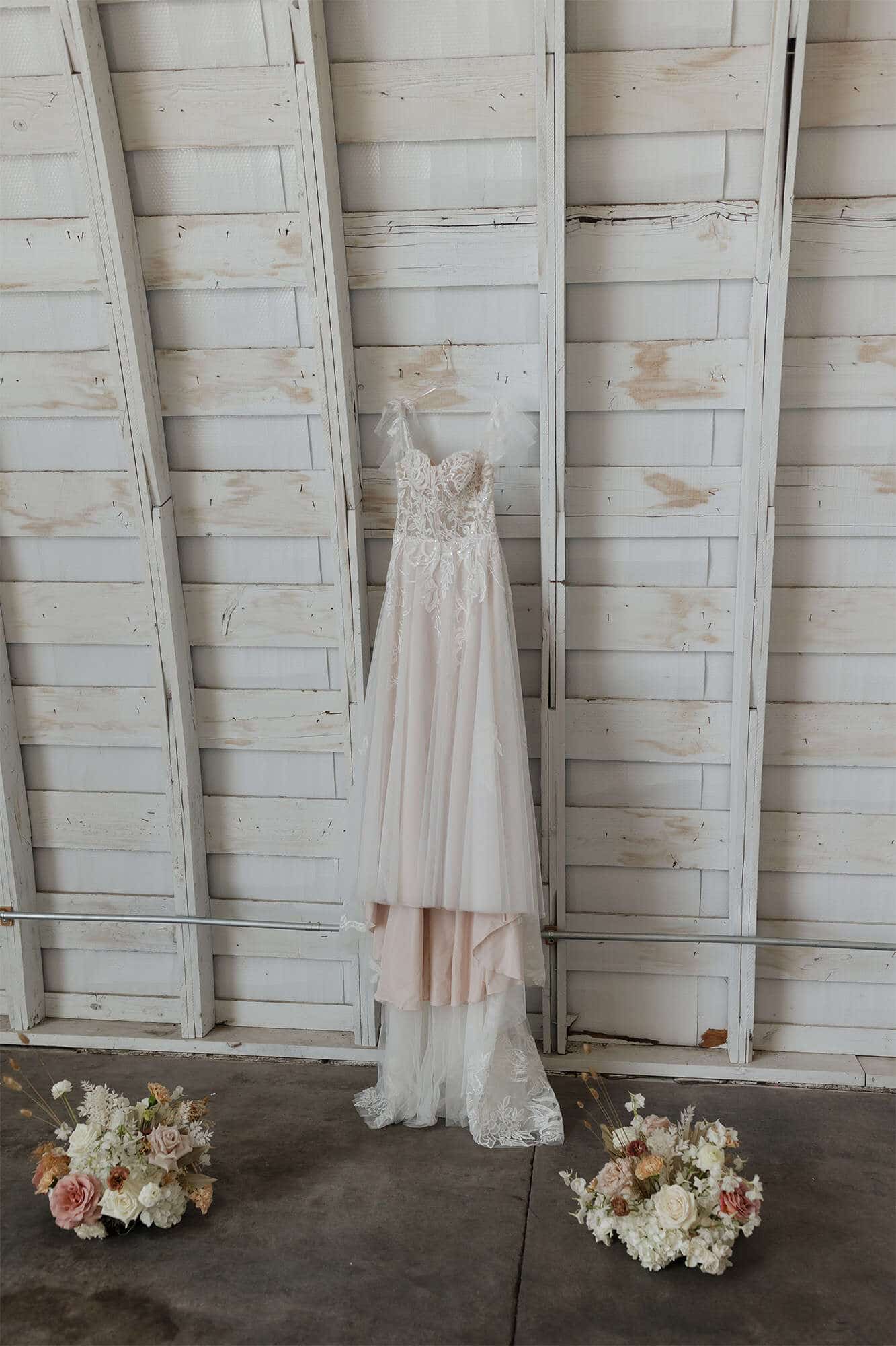 Ivory wedding gown from Charlotte’s Bridal, Eau Claire