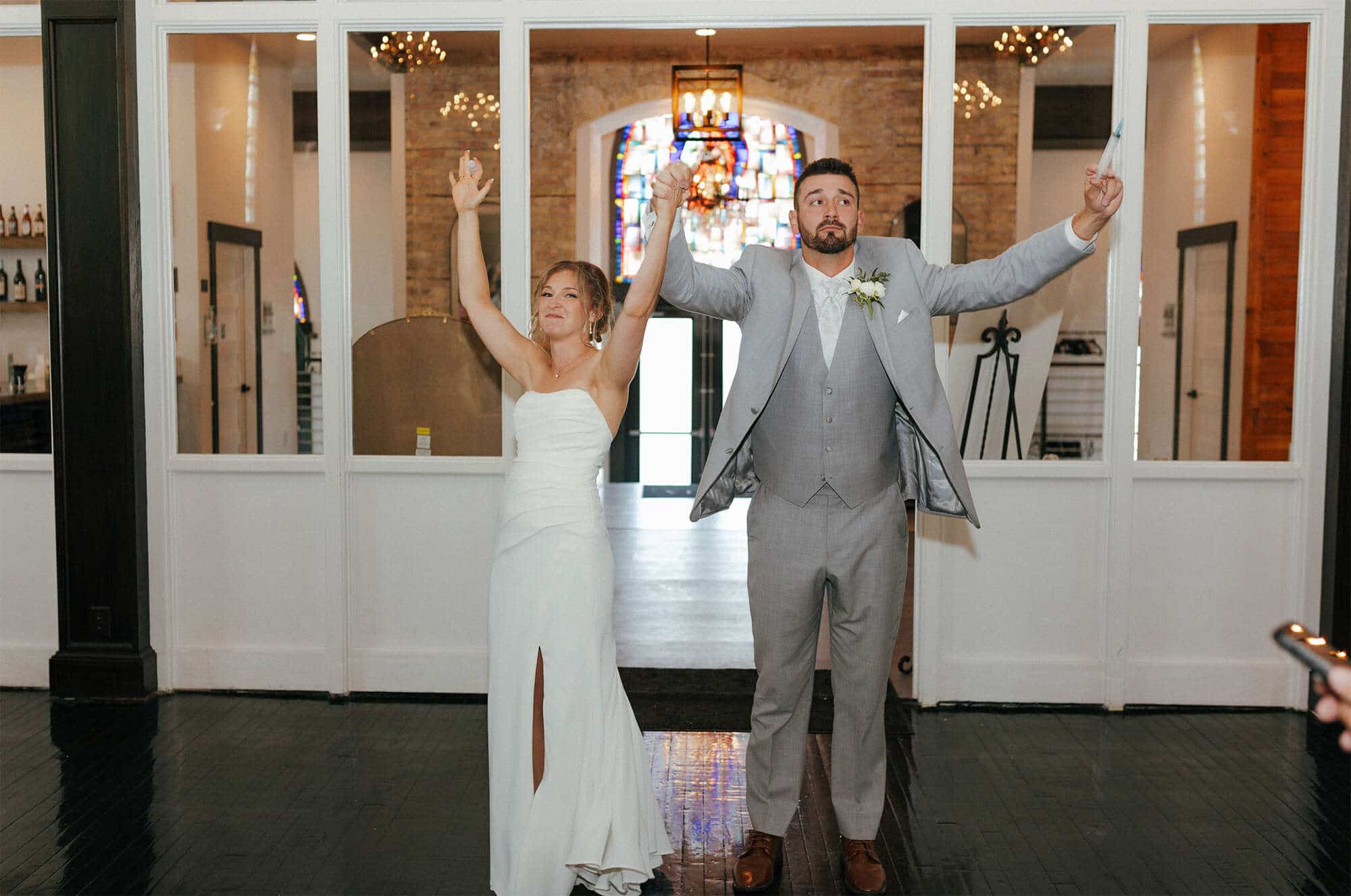 Bride and Groom enter their reception at Sepia Wedding & Event Venue