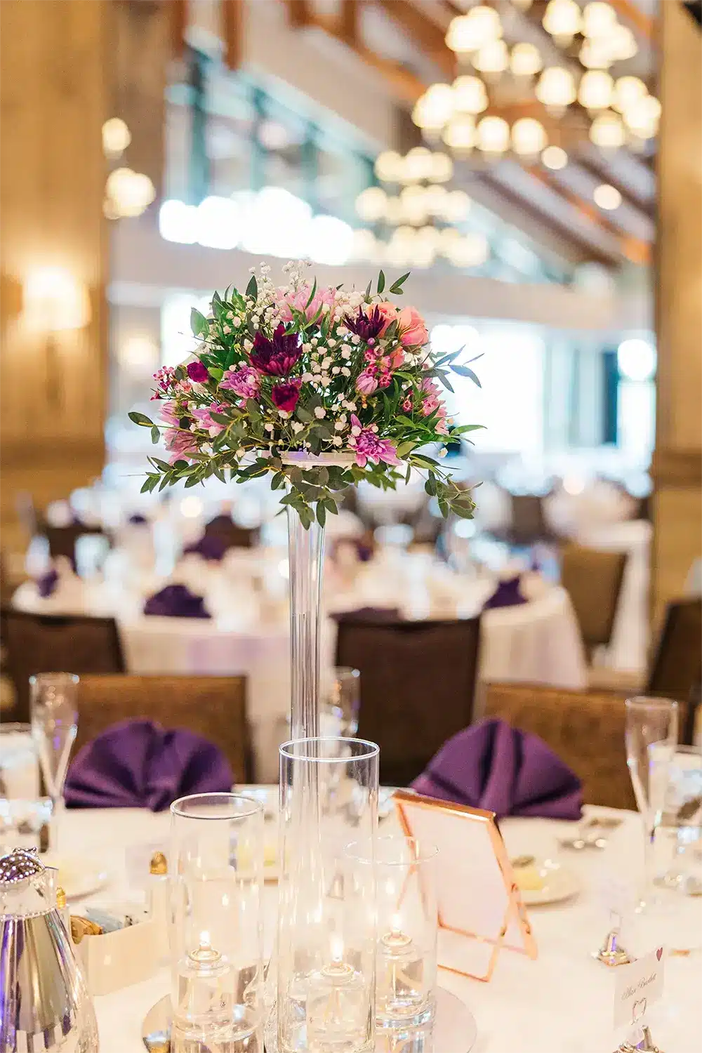 Vibrant centerpiece created by Lily & Vine Floral at Stevens Point wedding reception. Vibrant centerpiece created by Lily & Vine Floral at Stevens Point wedding reception.