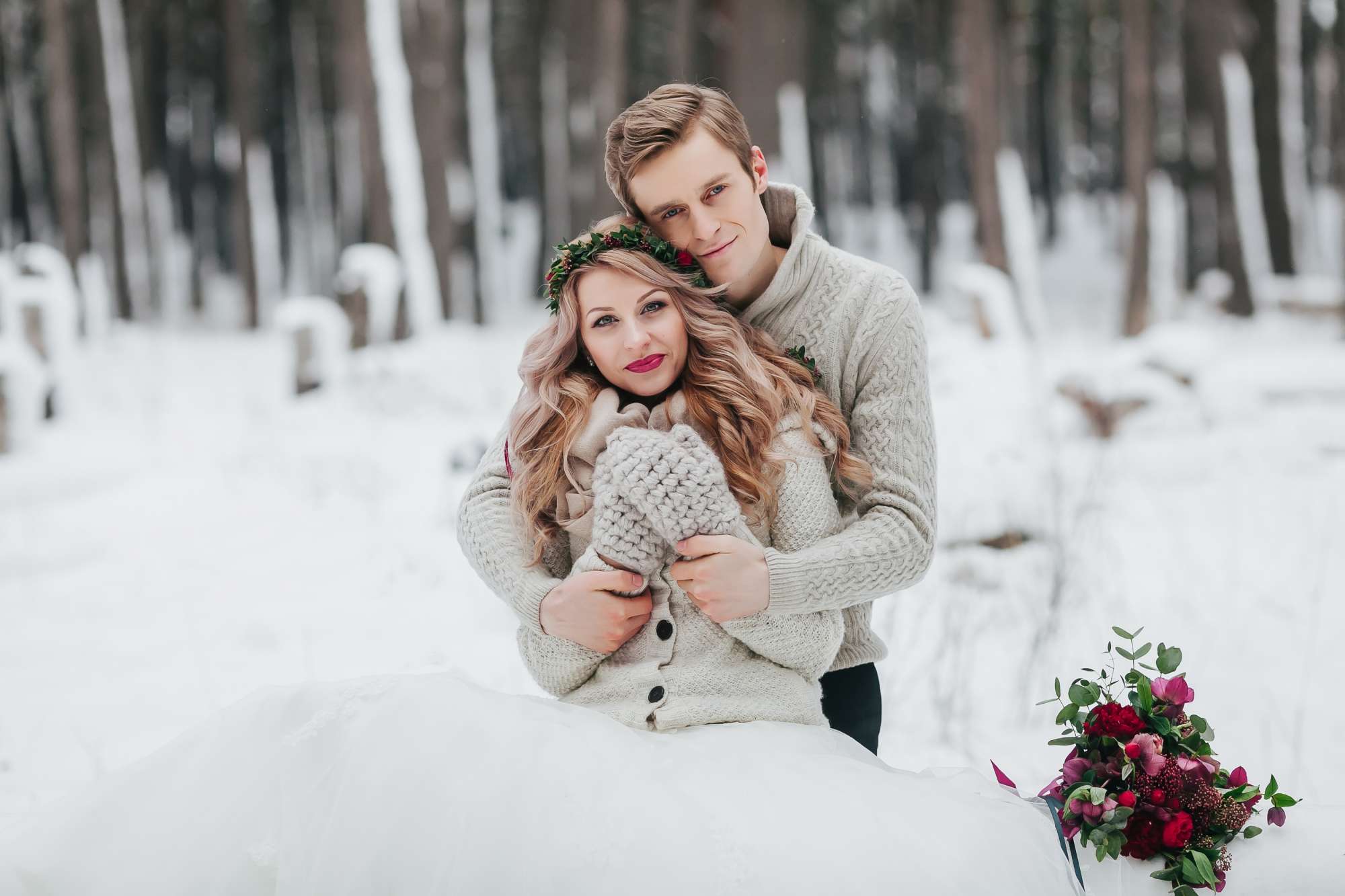 Bride and groom in snow- Elkhart Lake Wedding Showcase
