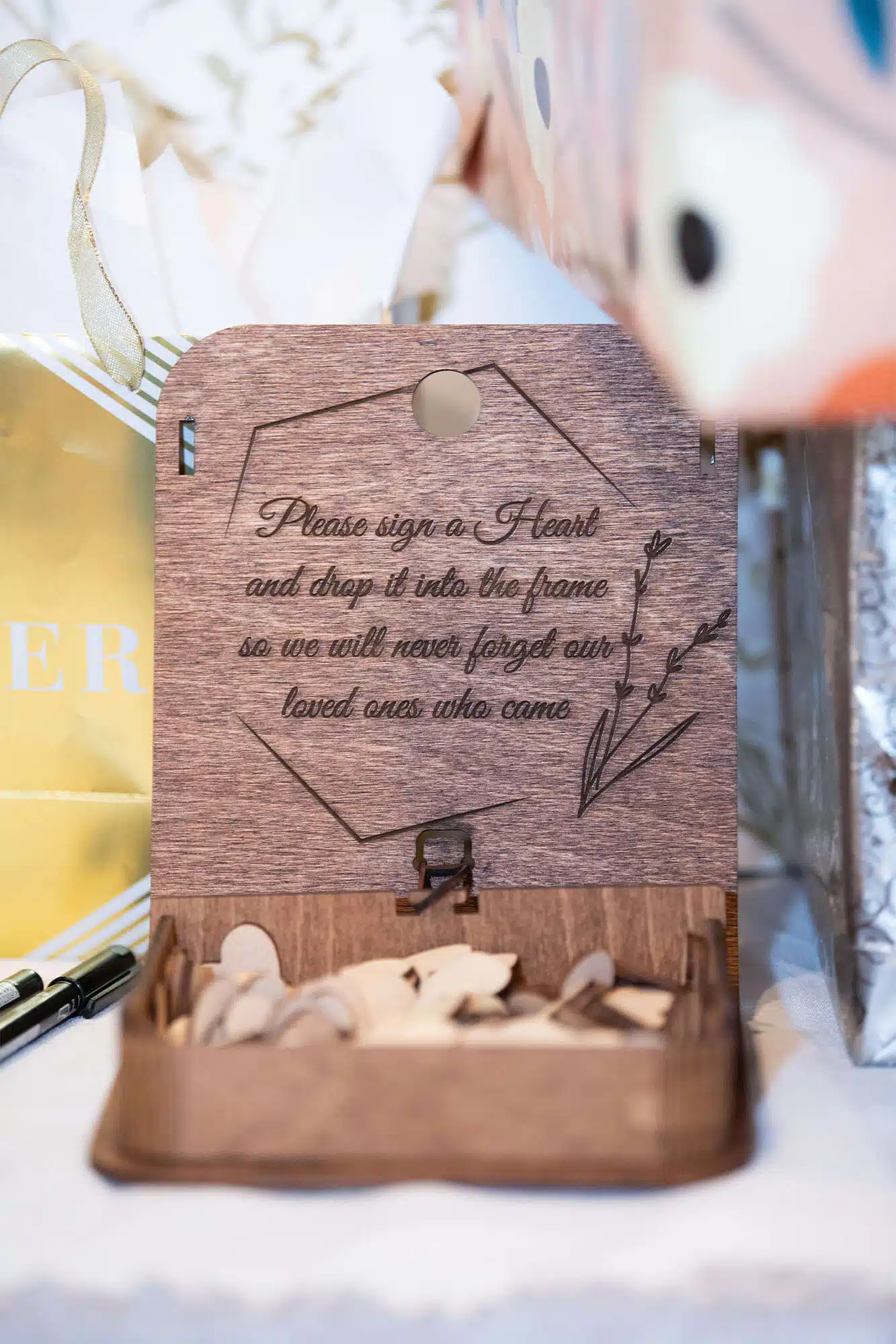 Please sign a Heart and drop in frame guest registry at Door County wedding