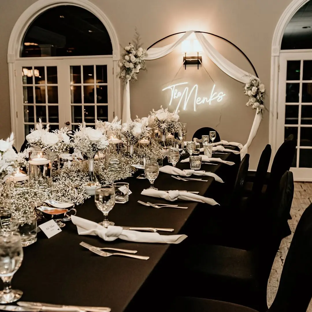 elegant white and black table settings and decor by I Do Decorating & Rental Service