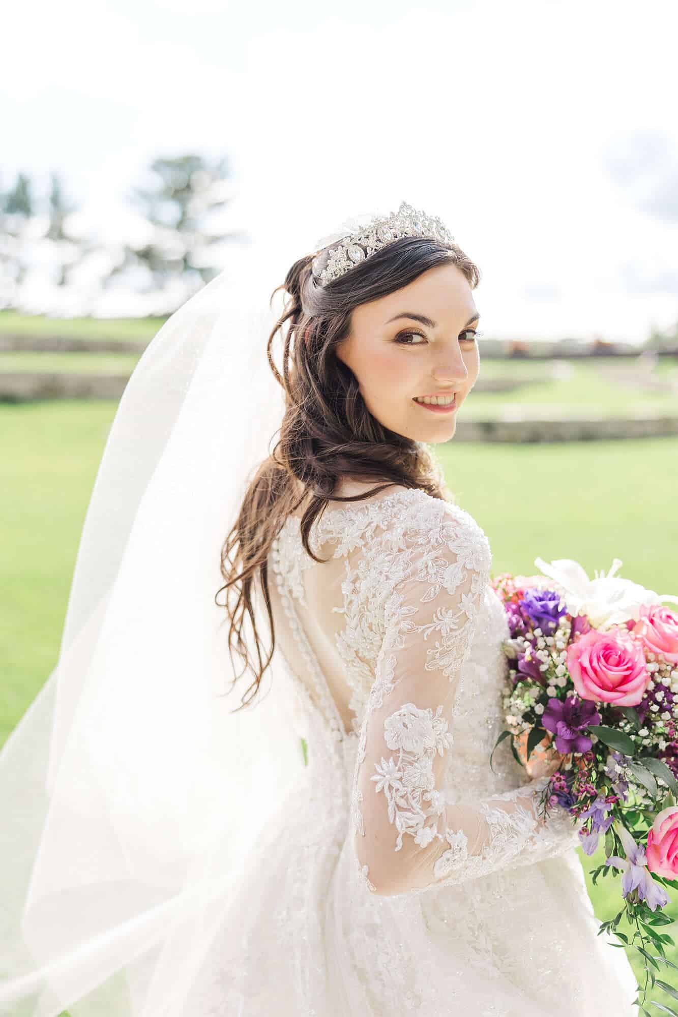 Beautiful bride in Demetrios gown from Elaine’s Wedding & Event Center, Green Bay