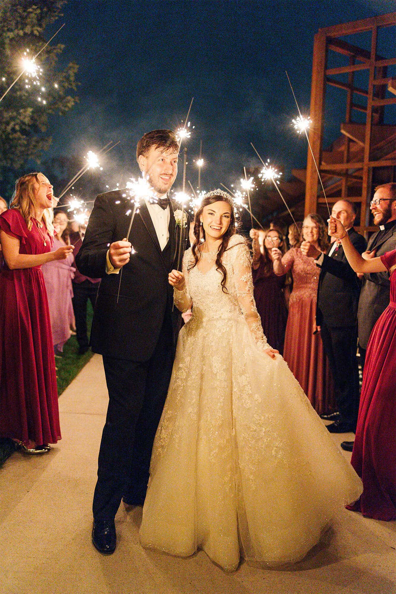 Bride and Groom with sparkler fireworks at SentryWorld reception