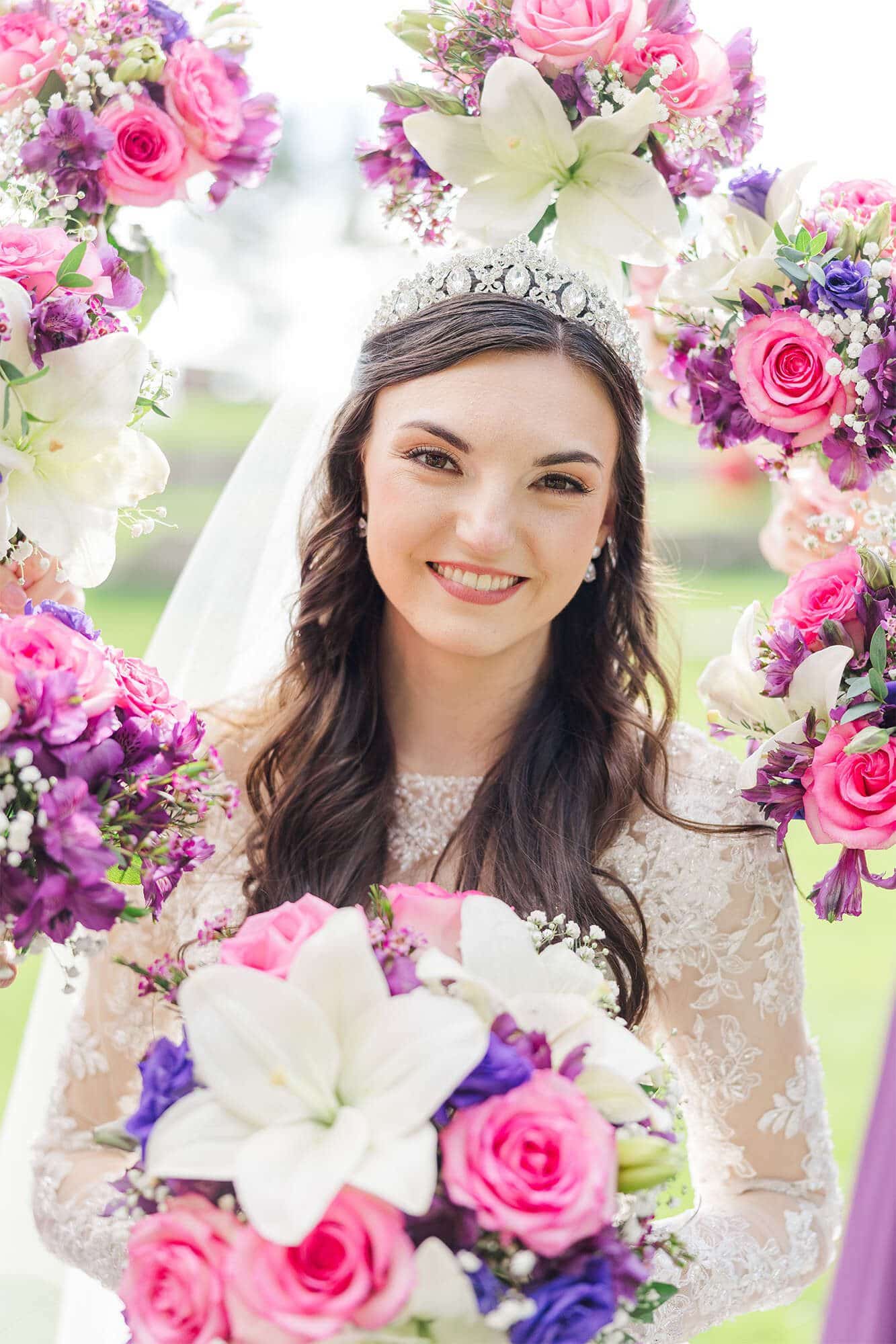 Bride with flowers from Lily & Vine Floral and Gifts