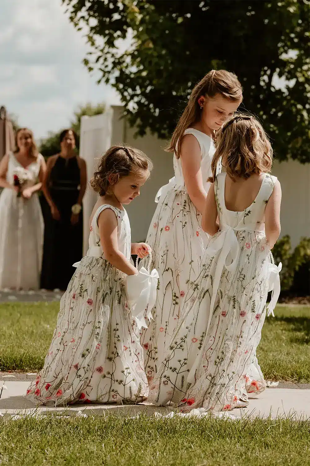 Summer Wedding with three young flower girls at LaSures Oshkosh Embers Media Co Summer Wedding with three young flower girls at LaSures Oshkosh Embers Media Co