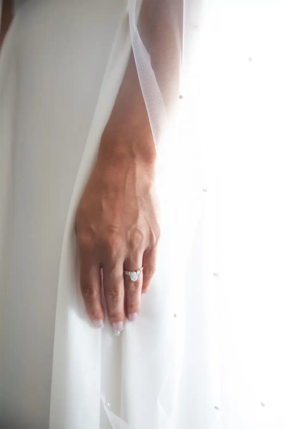 Diamond wedding ring. Veiled bride's wedding ring.