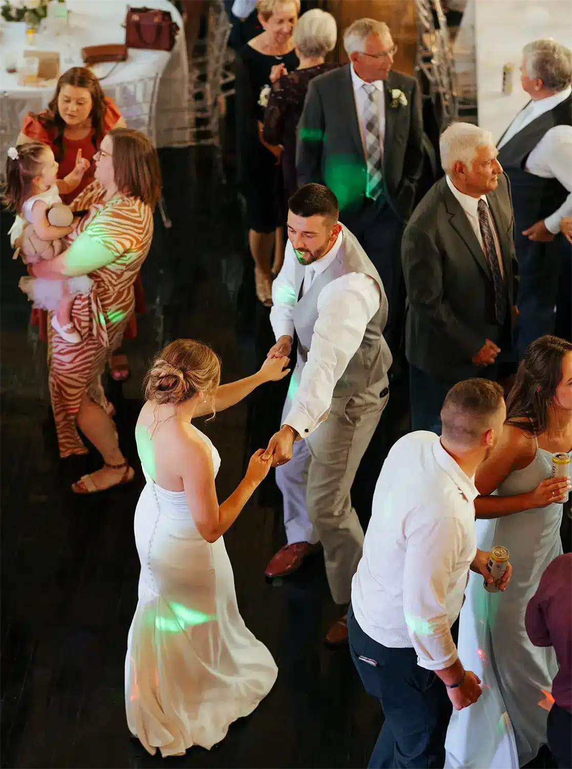Bride and groom dancing at their reception at Sepia Chapel in Two Rivers. Bride and groom dancing at their reception at Sepia Chapel in Two Rivers.