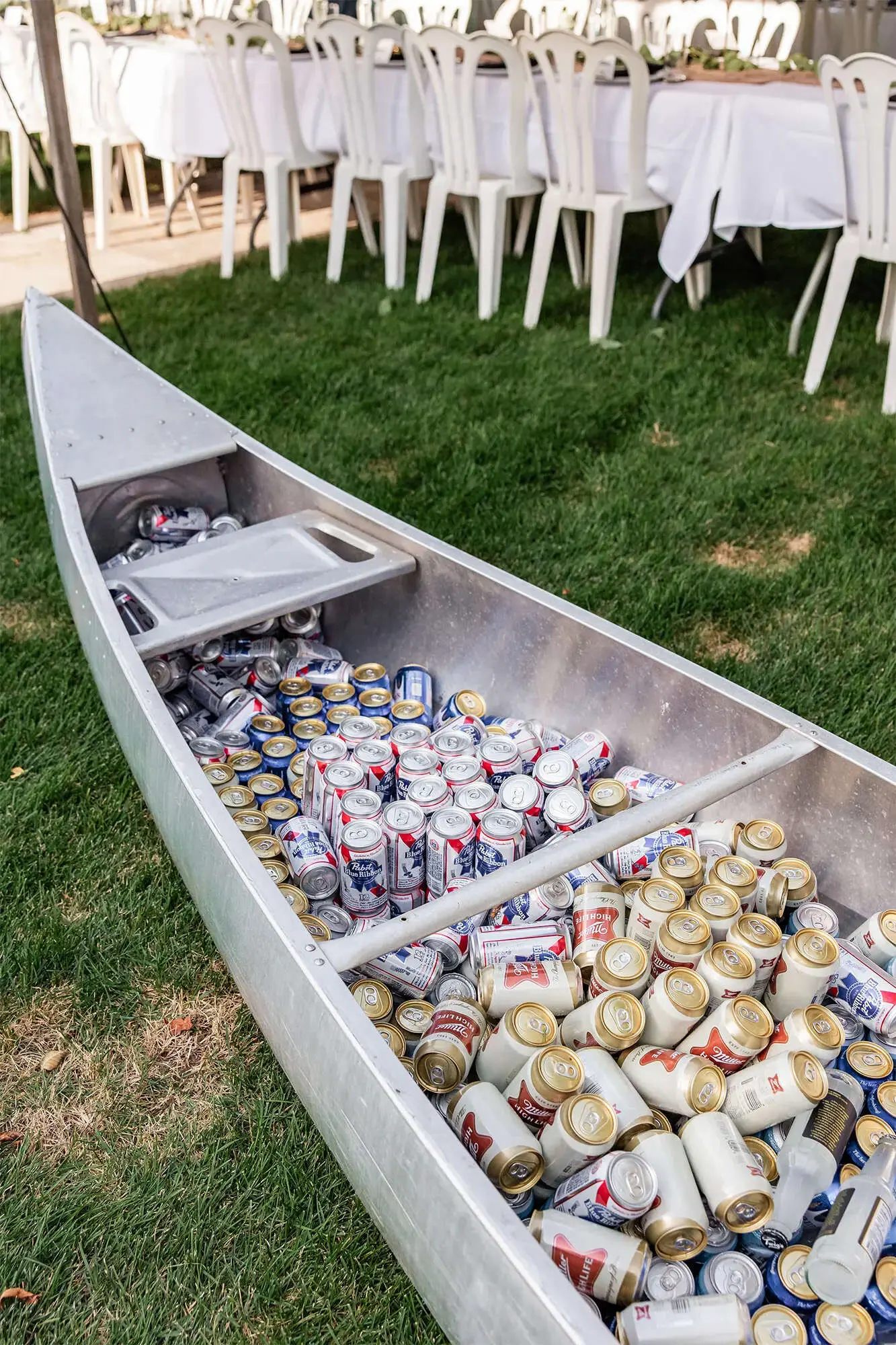 Clintonville-lakeside-wedding-reception-07 Aluminum canoe "cooler" full of beer