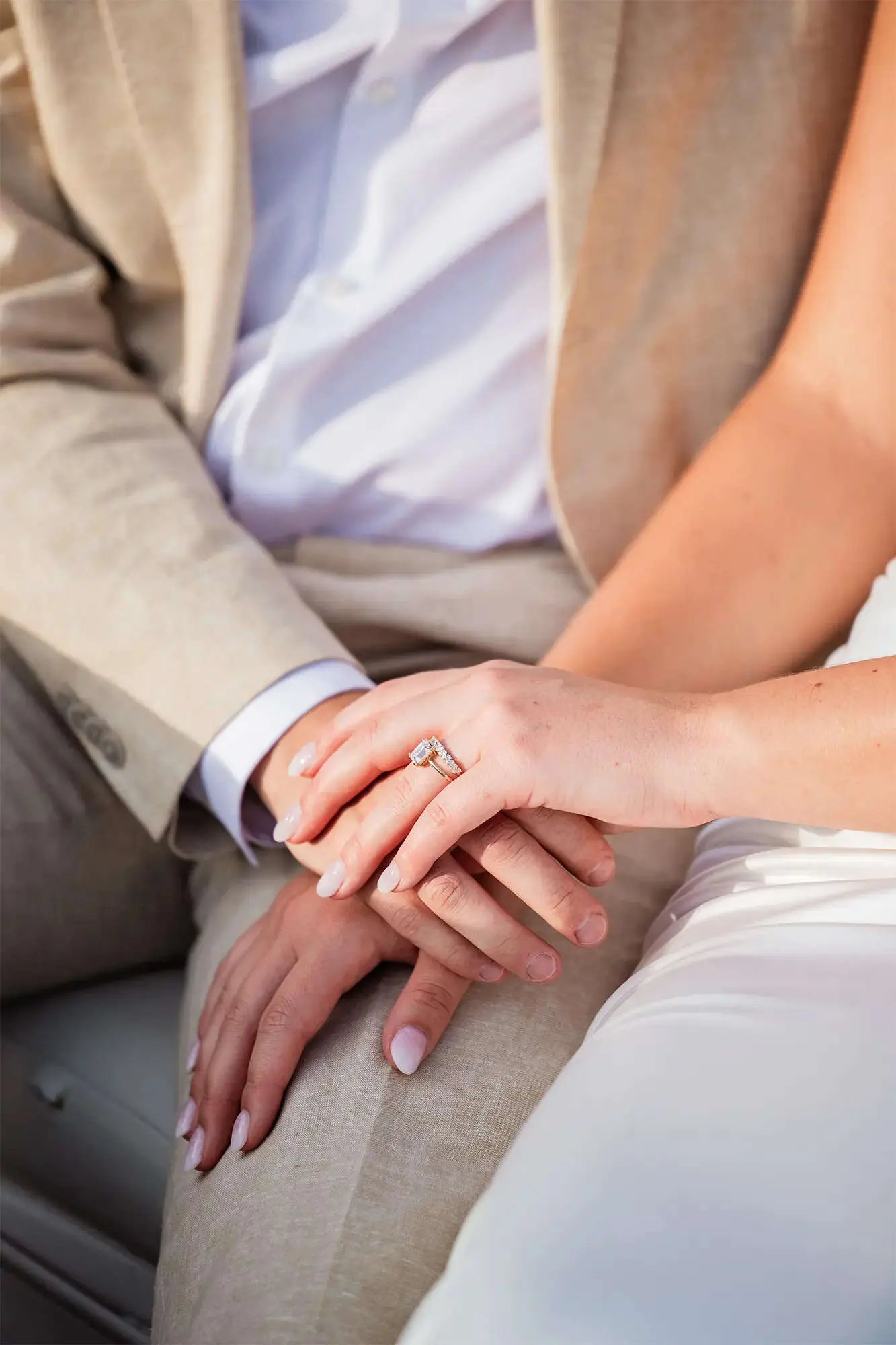 Clintonville-lakeside-wedding-reception-30 Bride's diamond band and emerald cut ring by Vrai