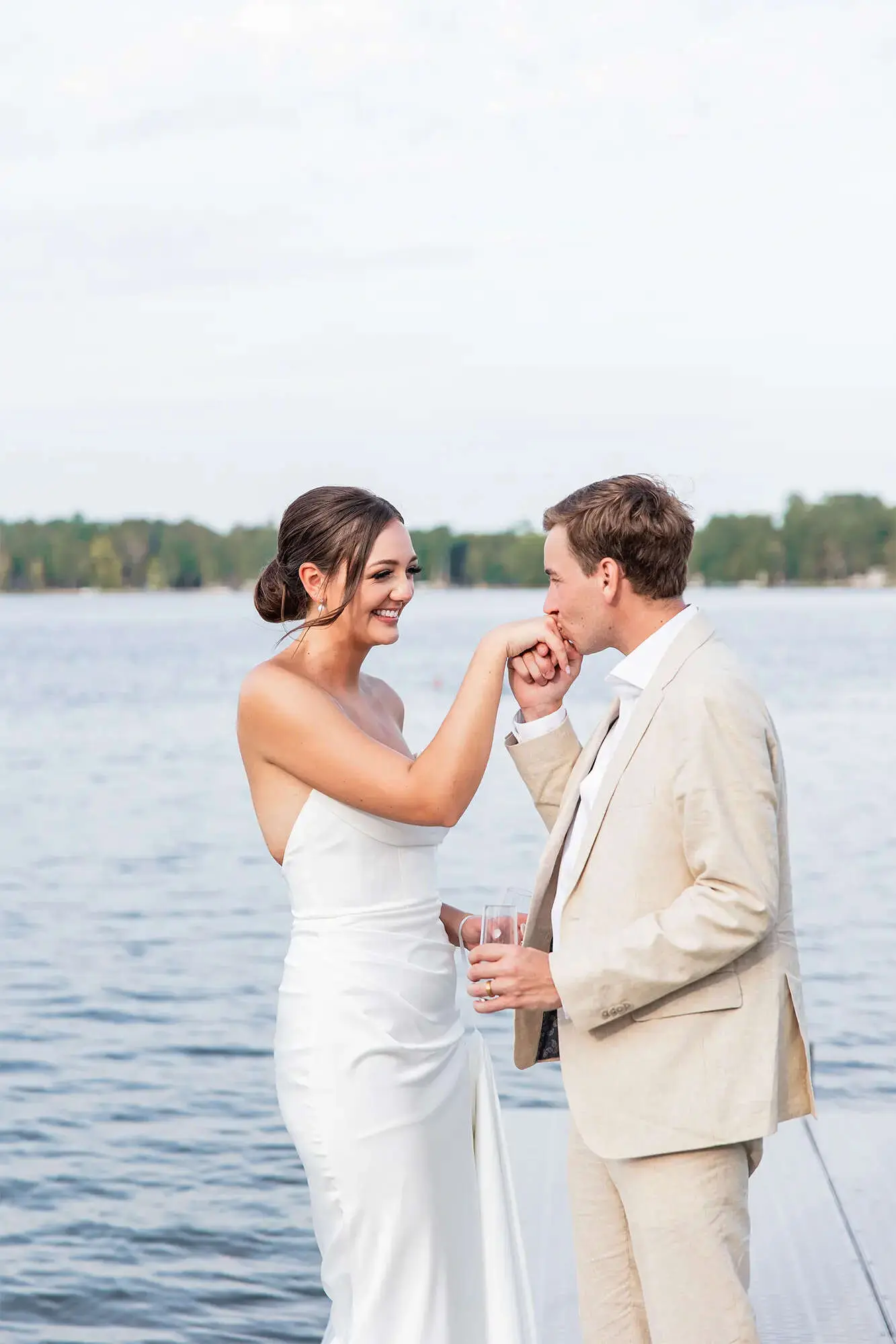 Clintonville-lakeside-wedding-reception-33 Groom in tan suit by Men's Wearhouse