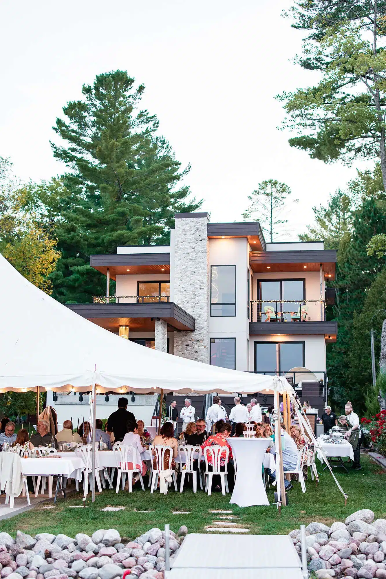 clintonville-lakeside-wedding-reception-77 Bride's family home on the lake with white tent and dinner tables on lawn