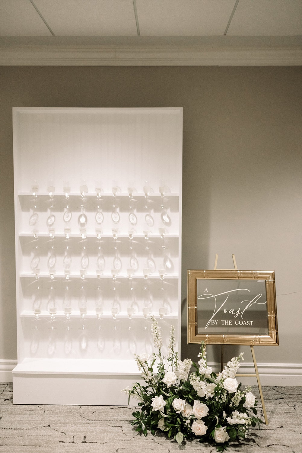 Champagne wall with mirror signage. Champagne wall with mirror signage.