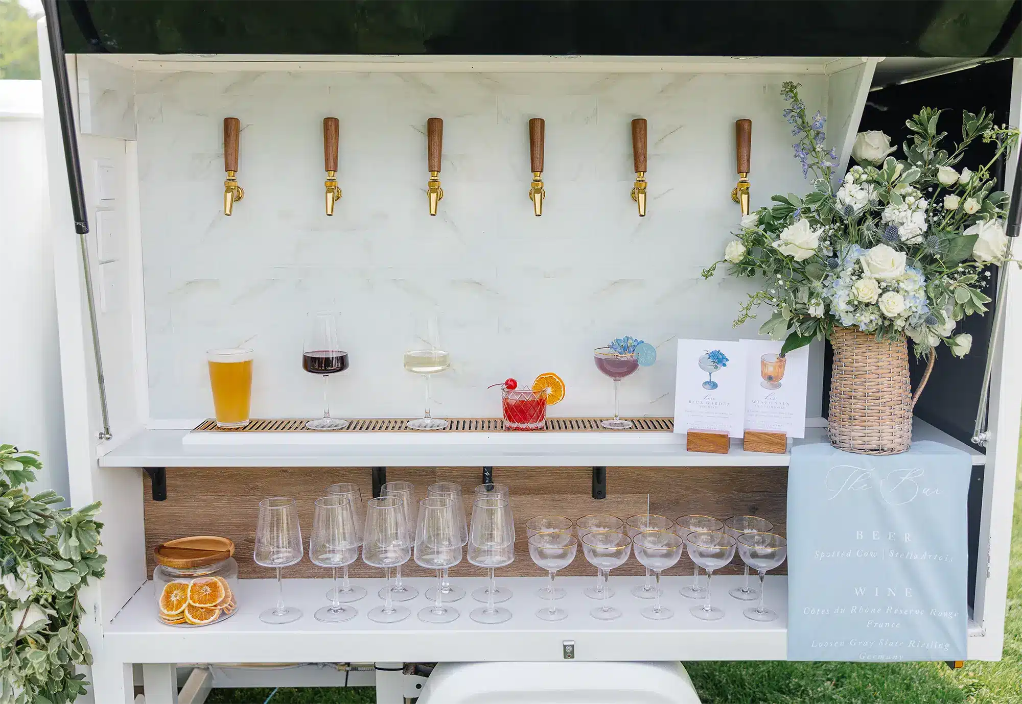 Vintage Piaggio Ape bar cart,Polly, all set up with variety of drinks.