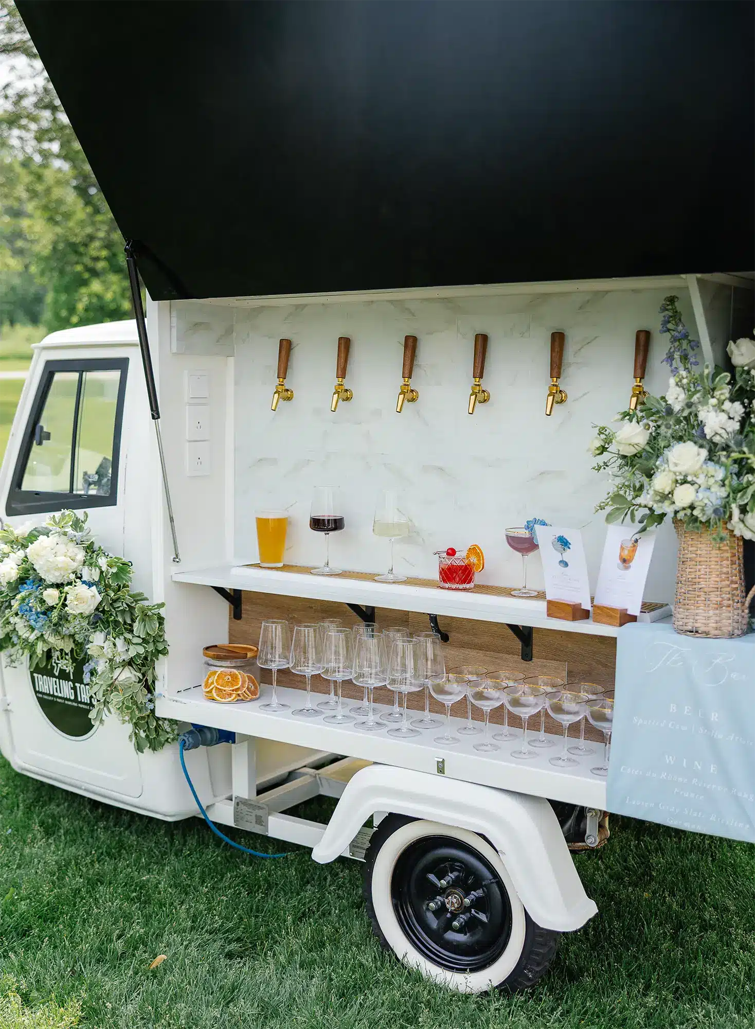 Traveling Taps mobile bar, set up to serve custom drinks.
