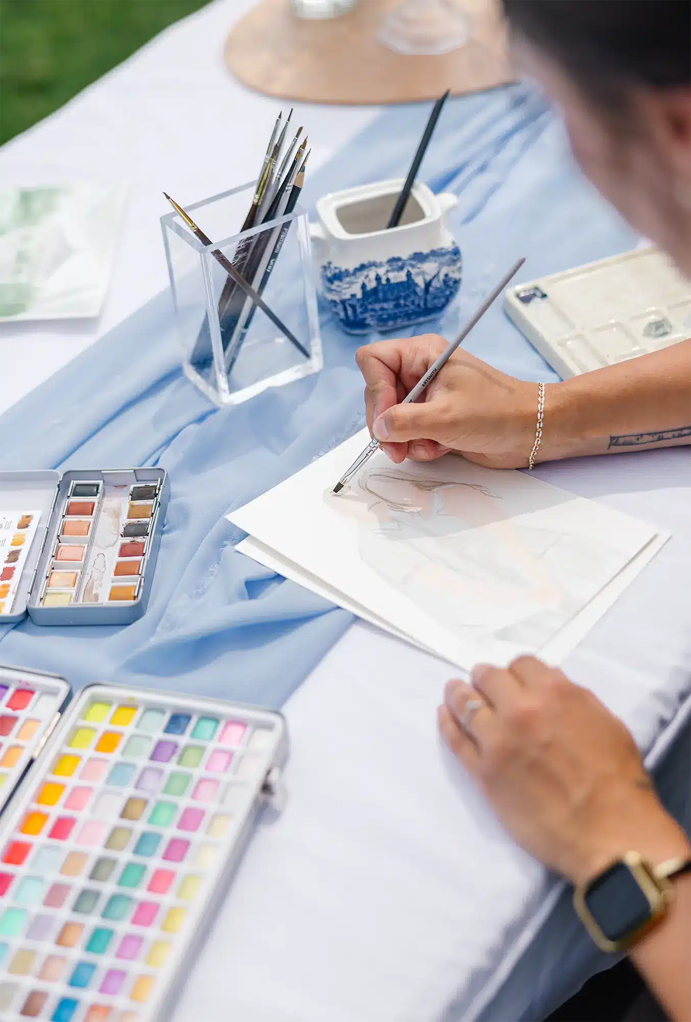 Watercolor painting in progress. Brush Strokes and Bubbly artist working on a painting.