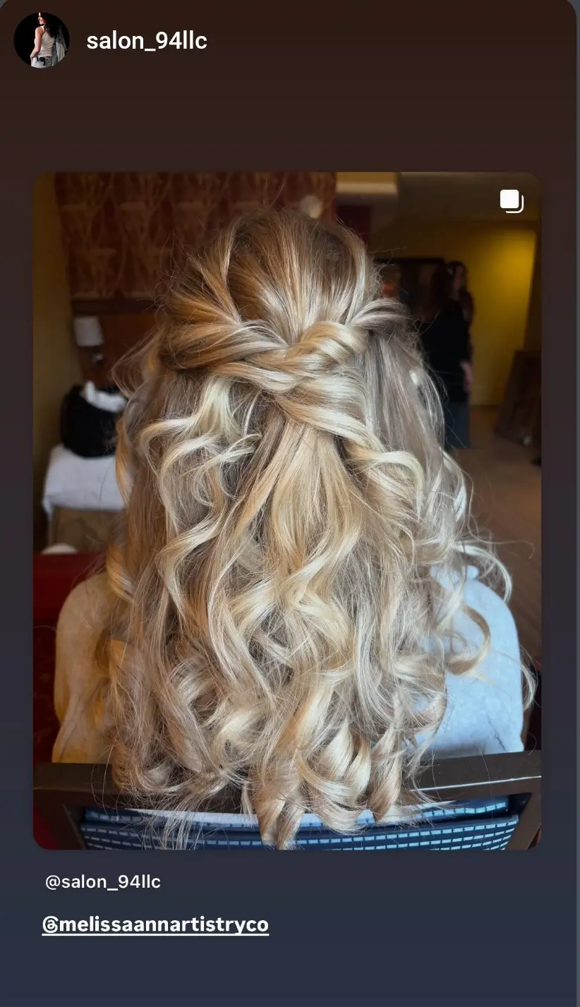 Bride with undone boho braid and curls.