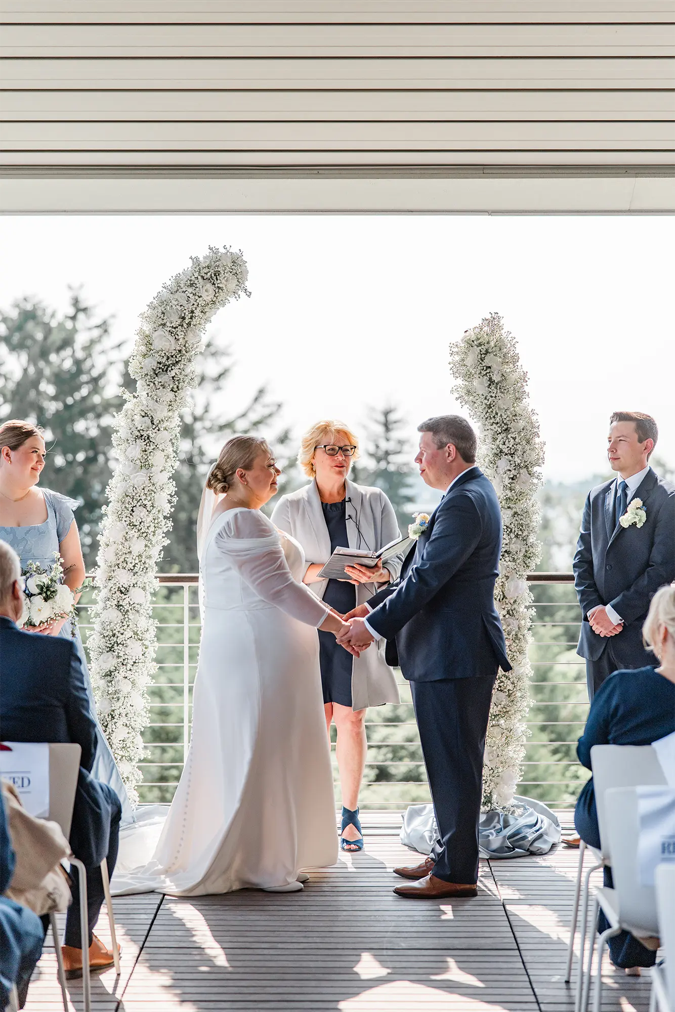 Outdoor Wedding Ceremony at Kress Pavilion Bride and groom exchanging vows during their outdoor ceremony at Kress Pavilion in Egg Harbor, Door County.
